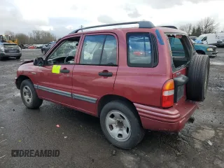 2000 Suzuki Vitara JX z VIN 2S3TD52V9Y6100173, wystawiony jako Copart lot #86200824 z przebiegiem Nie podano mil oraz Szkody całkowita. Historia ofert i sprzedaży dostępna na DreamBid. Obrazek 2.
