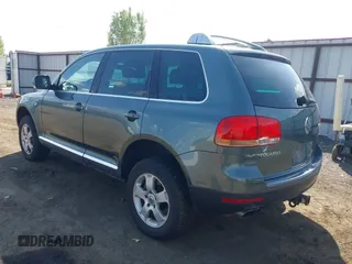 2004 Volkswagen Touareg with VIN WVGEM77L54D061132, listed as a IAAI auction lot 42127905 with 146,801 mi miles and . Bid and sale history available at DreamBid. Image 3.