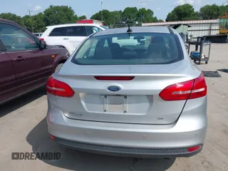 2015 Ford Focus SE z VIN 1FADP3F21FL348863, wystawiony jako IAAI lot #42401820 z przebiegiem 126 329 mil mil oraz . Historia ofert i sprzedaży dostępna na DreamBid. Obrazek 16.