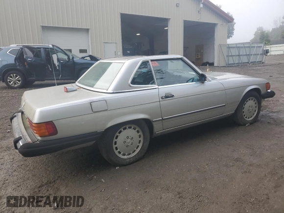 1986 Mercedes-Benz 560 SL z VIN WDBBA48D2GA044461, wystawiony jako Copart lot #65802964 z przebiegiem 128 074 mil mil oraz Czysty tytuł • Clean title. Historia ofert i sprzedaży dostępna na DreamBid. Obrazek 3.
