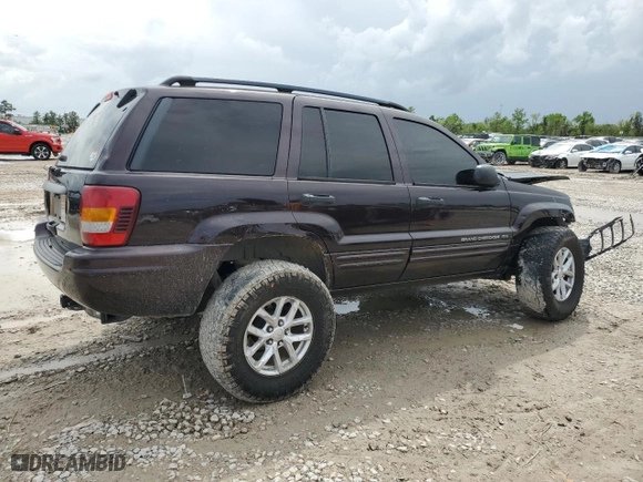 2004 Jeep Grand Cherokee Laredo with VIN 1J4GX48S44C150571, listed as a Copart auction lot 51013675 with 260,986 mi miles and Salvage Title. Bid and sale history available at carsss.com. Image 3.