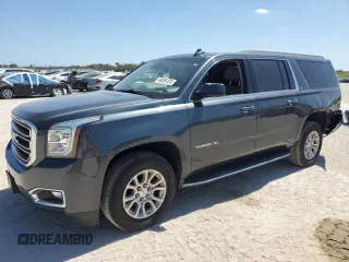 2019 GMC Yukon XL SLT with VIN 1GKS1GKC6KR289880, listed as a Copart auction lot 48006125 with 82,189 mi miles and Salvage Title. Bid and sale history available at carsss.com. Image 1.