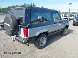 1989 Ford Bronco z VIN 1FMCU14T7KUB49671, wystawiony jako IAAI lot #42404266 z przebiegiem 22 883 mil mil oraz . Historia ofert i sprzedaży dostępna na DreamBid. Obrazek 4.