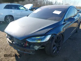 2016 Tesla Model X 70D z VIN 5YJXCAE28GF004461, wystawiony jako IAAI lot #41004214 z przebiegiem 158 962 mil mil oraz . Historia ofert i sprzedaży dostępna na DreamBid. Obrazek 19.