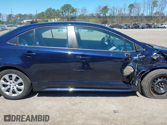 2022 Toyota Corolla LE with VIN 5YFEPMAE8NP320053, listed as a IAAI auction lot 42020183 with 6,673 mi miles and . Bid and sale history available at carsss.com. Image 13.