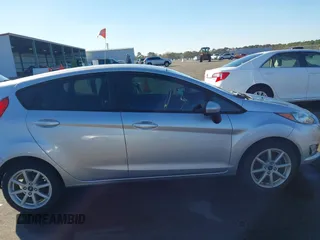2019 Ford Fiesta SE with VIN 3FADP4EJ0KM107058, listed as a IAAI auction lot 40979683 with 116,854 mi miles. Bid and sale history available at carsss.com. Image 13.