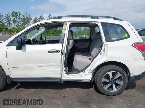 2018 Subaru Forester z VIN JF2SJABC5JH444739, wystawiony jako IAAI lot #42123918 z przebiegiem 124 520 mil mil oraz . Historia ofert i sprzedaży dostępna na DreamBid. Obrazek 6.