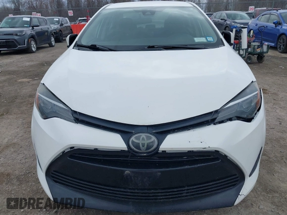 2019 Toyota Corolla L with VIN 5YFBURHE0KP889909, listed as a IAAI auction lot 41888953 with 130,529 mi miles. Bid and sale history available at carsss.com. Image 17.