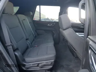 2023 Chevrolet Tahoe LS z VIN 1GNSKMKD4PR184687, wystawiony jako Copart lot #52014155 z przebiegiem 27 363 mil mil oraz Szkoda całkowita • Salvage title. Historia ofert i sprzedaży dostępna na DreamBid. Obrazek 11.