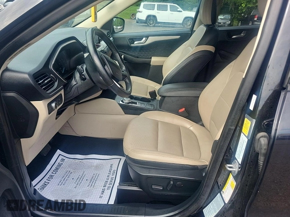 2020 Ford Escape SEL with VIN 1FMCU9H62LUA82501, listed as a IAAI auction lot 42843901 with 98,316 mi miles and . Bid and sale history available at DreamBid. Image 4.
