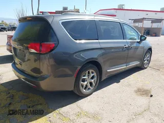 2017 Chrysler Pacifica Touring L with VIN 2C4RC1BG0HR826881, listed as a IAAI auction lot 42171240 with 214,188 mi miles and . Bid and sale history available at DreamBid. Image 4.