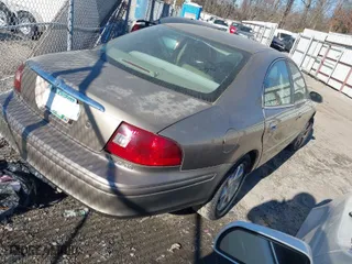 2002 Mercury Sable GS with VIN 1MEFM50UX2A632773, listed as a IAAI auction lot 41280080 with 207,147 mi miles. Bid and sale history available at carsss.com. Image 4.