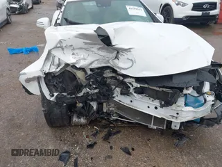 2016 Mercedes-Benz SLK 300 z VIN WDDPK3JA4GF123735, wystawiony jako IAAI lot #41559315 z przebiegiem Nie podano mil oraz . Historia ofert i sprzedaży dostępna na DreamBid. Obrazek 6.