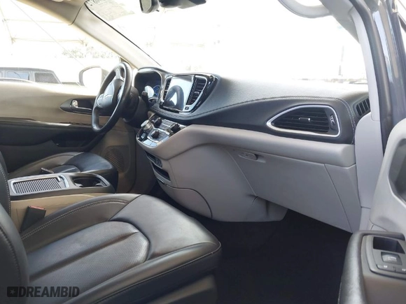 2023 Chrysler Pacifica Hybrid Touring L with VIN 2C4RC1L73PR509853, listed as a IAAI auction lot 41690872 with 83,014 mi miles. Bid and sale history available at carsss.com. Image 5.