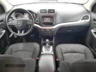 2015 Dodge Journey SXT with VIN 3C4PDDBG0FT660457, listed as a Copart auction lot 54582265 with 164,879 mi miles and Salvage title. Bid and sale history available at DreamBid. Image 8.