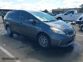 2014 Toyota Prius v Two with VIN JTDZN3EU4E3332759, listed as a IAAI auction lot 41939605 with 115,288 mi miles. Bid and sale history available at carsss.com. Image 1.