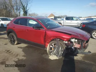2024 Mazda CX-30 Premium z VIN 3MVDMBDY1RM603405, wystawiony jako Copart lot #42695915 z przebiegiem Nie podano mil oraz Szkoda całkowita • Salvage title. Historia ofert i sprzedaży dostępna na DreamBid. Obrazek 4.