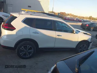 2019 Nissan Rogue SL with VIN 5N1AT2MV0KC841763, listed as a IAAI auction lot 40810670 with 54,315 mi miles and . Bid and sale history available at carsss.com. Image 13.