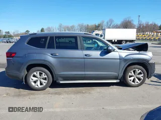 2018 Volkswagen Atlas SE with VIN 1V2CR2CA0JC571988, listed as a IAAI auction lot 41848862 with 96,426 mi miles and . Bid and sale history available at DreamBid. Image 13.