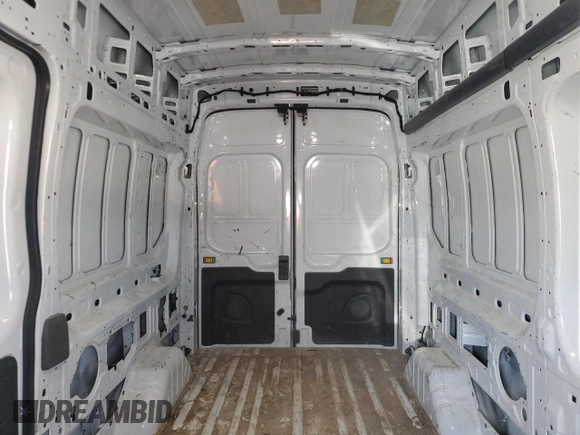 2024 Ford Transit Cargo z VIN 1FTBR2X8XRKA11725, wystawiony jako Copart lot #57682345 z przebiegiem 53 975 mil mil oraz Czysty tytuł • Clean title. Historia ofert i sprzedaży dostępna na DreamBid. Obrazek 10.