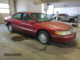 1998 Lincoln Continental with VIN 1LNFM97V6WY622919, listed as a Copart auction lot 70195324 with 219,712 mi miles and Non Repairable. Bid and sale history available at carsss.com. Image 4.