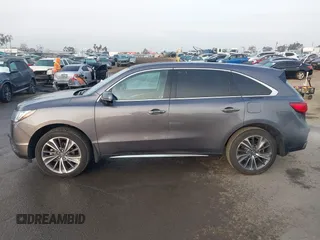 2019 Acura MDX Technology z VIN 5J8YD3H59KL010487, wystawiony jako IAAI lot #41478493 z przebiegiem 55 315 mil mil oraz . Historia ofert i sprzedaży dostępna na DreamBid. Obrazek 14.