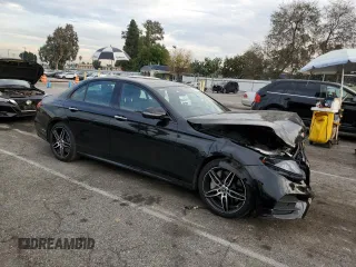 2020 Mercedes-Benz E-Class E 450 with VIN WDDZF6JBXLA748428, listed as a Copart auction lot 40687454 with 13,055 mi miles and Salvage Title. Bid and sale history available at carsss.com. Image 4.