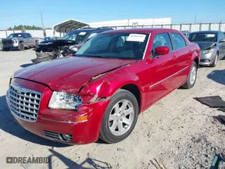 2007 Chrysler 300 Limited with VIN 2C3KA53G27H604106, listed as a IAAI auction lot 41661449 with 113,380 mi miles. Bid and sale history available at carsss.com. Image 2.