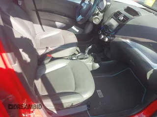 2015 Chevrolet Spark EV LT with VIN KL8CL6S0XFC818985, listed as a IAAI auction lot 41712056 with 69,143 mi miles. Bid and sale history available at carsss.com. Image 5.