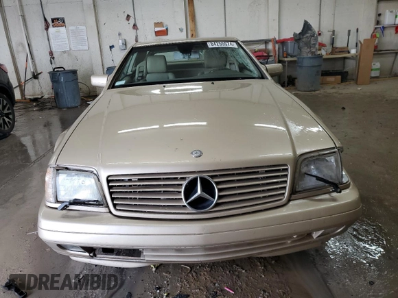 1997 Mercedes-Benz SL 500 with VIN WDBFA67F5VF147986, listed as a Copart auction lot 84255574 with 158,607 mi miles and Salvage title. Bid and sale history available at DreamBid. Image 5.