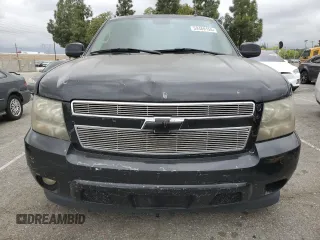 2007 Chevrolet Tahoe LT z VIN 1GNFC13047R276388, wystawiony jako Copart lot #53469155 z przebiegiem Nie podano mil oraz Szkoda całkowita • Salvage title. Historia ofert i sprzedaży dostępna na DreamBid. Obrazek 5.