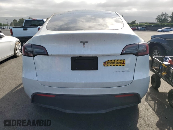 2024 Tesla Model Y Long Range with VIN 7SAYGDEE1RF025842, listed as a Copart auction lot 56226065 with Not provided miles and Non repairable. Bid and sale history available at DreamBid. Image 6.