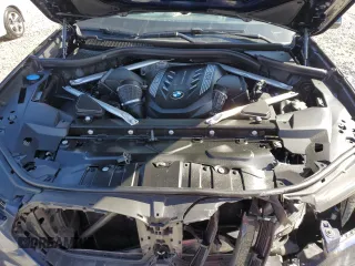 2021 BMW X6 M50i with VIN 5UXCY8C09M9E66884, listed as a Copart auction lot 63025622 with 26,220 mi miles and Salvage Title. Bid and sale history available at carsss.com. Image 7.