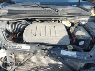2013 Dodge Grand Caravan SXT with VIN 2C4RDGCG4DR602893, listed as a IAAI auction lot 41747242 with 206,213 mi miles and . Bid and sale history available at DreamBid. Image 10.