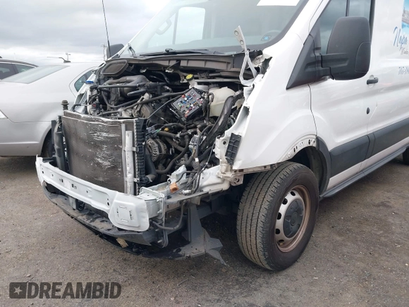 2020 Ford Transit Cargo with VIN 1FTBR1C8XLKA14891, listed as a IAAI auction lot 41435923 with 51,891 mi miles and . Bid and sale history available at DreamBid. Image 6.