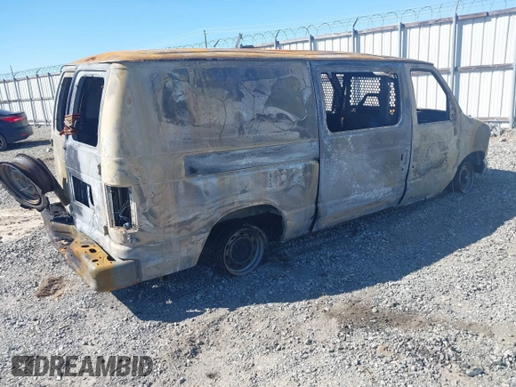 1998 Ford Econoline Cargo with VIN 1FTRE1423WHA86845, listed as a IAAI auction lot 41741274 with Not Provided miles. Bid and sale history available at carsss.com. Image 4.