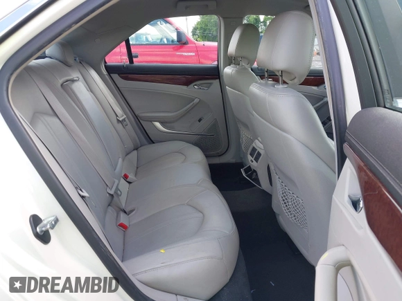 2012 Cadillac CTS Luxury with VIN 1G6DG5E57C0137409, listed as a IAAI auction lot 42633890 with 86,886 mi miles and . Bid and sale history available at DreamBid. Image 8.