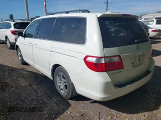 2007 Honda Odyssey EX-L with VIN 5FNRL38707B145049, listed as a IAAI auction lot 42117713 with 76,691 mi miles. Bid and sale history available at carsss.com. Image 3.