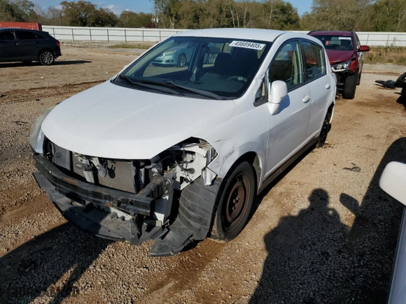 2010 Nissan Versa 1.8 S with VIN 3N1BC1CP6AL456039, listed as a Copart auction lot 49889405 with 120,974 mi miles and Salvage Title. Bid and sale history available at carsss.com. Image 1.