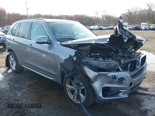 2014 BMW X5 xDrive35i z VIN 5UXKR0C52E0H19670, wystawiony jako IAAI lot #41909590 z przebiegiem 137 758 mil mil oraz . Historia ofert i sprzedaży dostępna na DreamBid. Obrazek 6.
