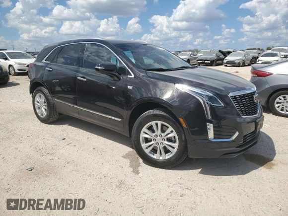 2024 Cadillac XT5 FWD Luxury with VIN 1GYKNAR42RZ731988, listed as a Copart auction lot 72777544 with 5,965 mi miles and Salvage title. Bid and sale history available at DreamBid. Image 4.