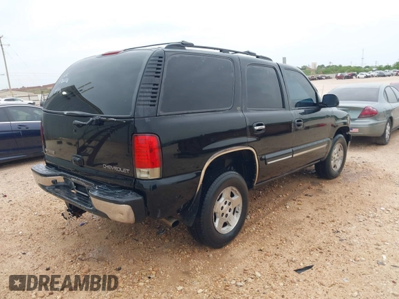 2002 Chevrolet Tahoe LT with VIN 1GNEC13Z72R176028, listed as a IAAI auction lot 41897050 with 216,553 mi miles. Bid and sale history available at carsss.com. Image 4.