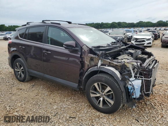 2016 Toyota RAV4 XLE with VIN 2T3RFREV9GW516247, listed as a Copart auction lot 56342505 with 105,718 mi miles and Salvage title. Bid and sale history available at DreamBid. Image 4.