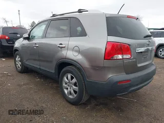 2012 Kia Sorento LX with VIN 5XYKTDA21CG244973, listed as a IAAI auction lot 41268549 with 211,858 mi miles. Bid and sale history available at carsss.com. Image 3.