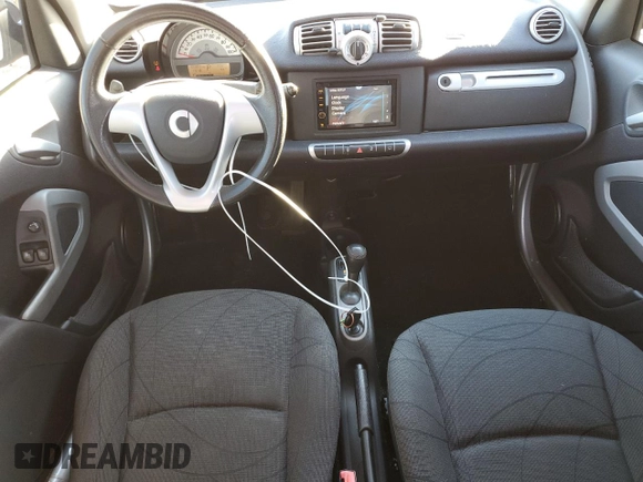 2011 Smart fortwo Pure with VIN WMEEJ3BA2BK425867, listed as a Copart auction lot 83676794 with 105,883 mi miles and Salvage title. Bid and sale history available at DreamBid. Image 8.