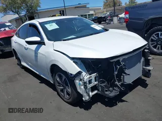 2020 Honda Civic LX with VIN 2HGFC2F67LH511473, listed as a IAAI auction lot 42614633 with 91,822 mi miles and . Bid and sale history available at DreamBid. Image 1.