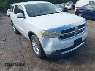 2013 Dodge Durango SXT with VIN 1C4RDJAG4DC512491, listed as a IAAI auction lot 42276406 with 219,766 mi miles and . Bid and sale history available at DreamBid. Image 6.