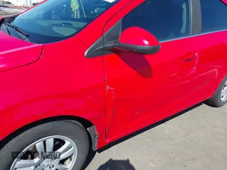 2014 Chevrolet Sonic LT z VIN 1G1JC5SHXE4203739, wystawiony jako IAAI lot #42030758 z przebiegiem 112 438 mil mil oraz . Historia ofert i sprzedaży dostępna na DreamBid. Obrazek 6.