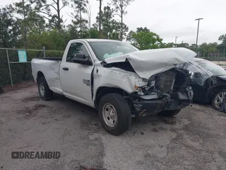 2023 Ram 1500 Tradesman with VIN 3C6JR6DG7PG674129, listed as a IAAI auction lot 42147365 with Not provided miles and . Bid and sale history available at DreamBid. Image 1.