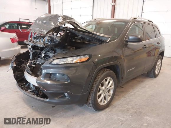 2016 Jeep Cherokee Latitude z VIN 1C4PJMCB3GW187502, wystawiony jako IAAI lot #42048898 z przebiegiem 151 450 mil mil oraz . Historia ofert i sprzedaży dostępna na DreamBid. Obrazek 2.